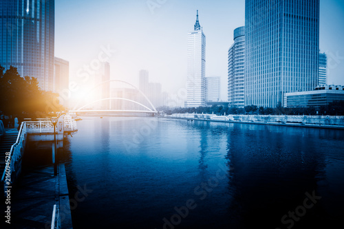 Tianjin Hai river waterfront downtown skyline with dagu bridge ,China.