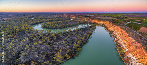 Aerial panoramic landscape of eroding sandstone shores of Murray RIver at dusk photo