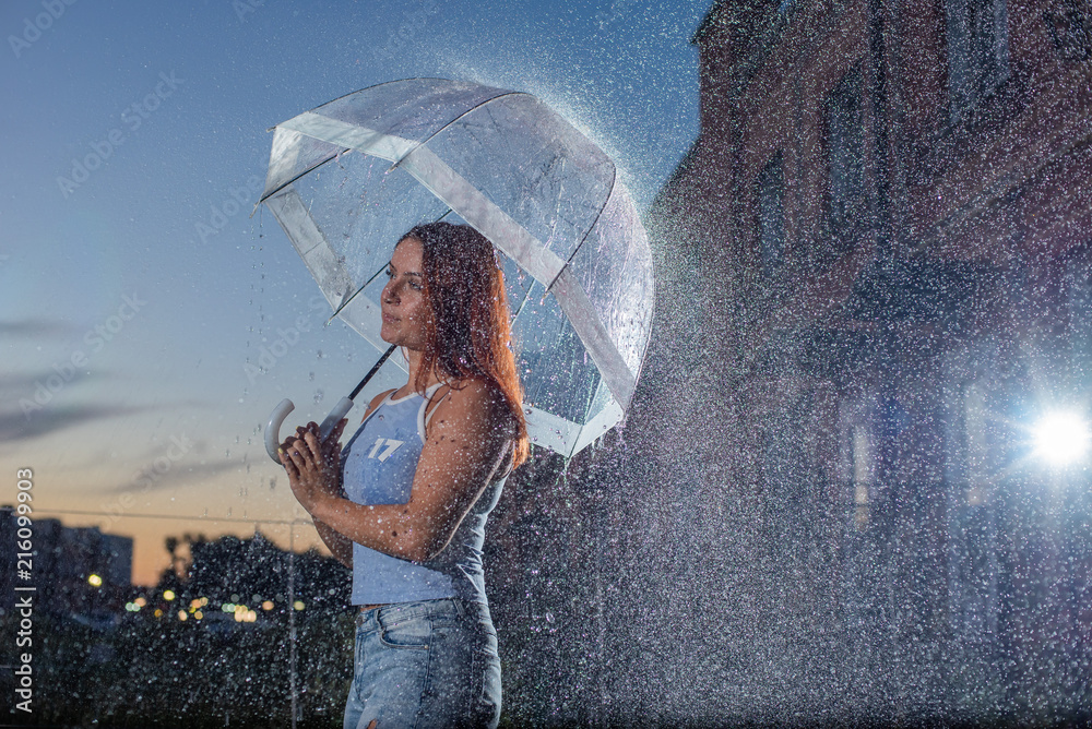 sad girl in the rain with umbrella