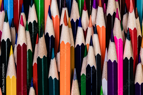 фотографія A very OCD triggering closeup photo of a messy and haphazard stack of very sharp colored pencils