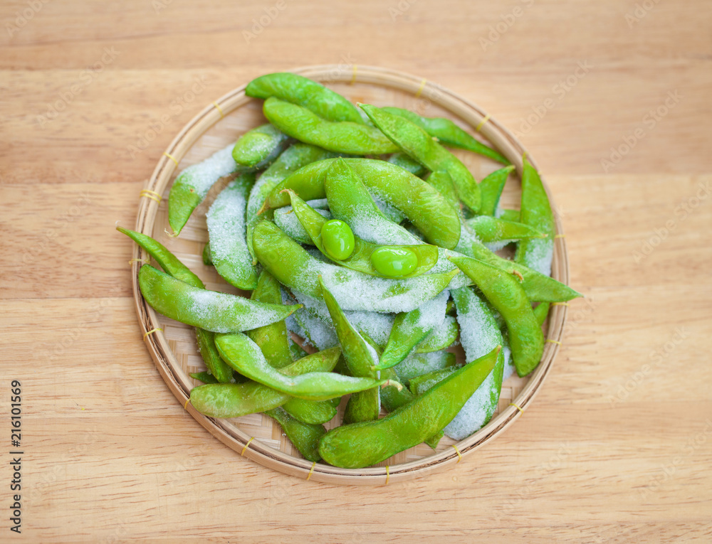 studio shot of Japanese style boiled beans EDAMAME on basket.. studio shot of Japanese style boiled beans EDAMAME on basket..