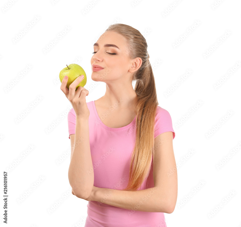 Young woman with apple on white background. Diet food concept Young woman with apple on white background. Diet food concept