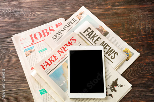 Tablet computer and newspap...