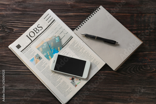 Newspaper, notepad and mobi...
