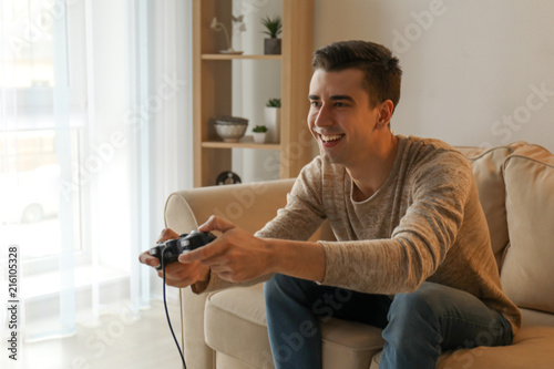 Happy young man enjoying vi...