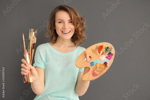 Female artist with tools an...