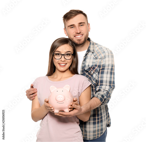 Happy couple holding piggy ...