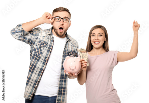 Emotional couple with piggy...