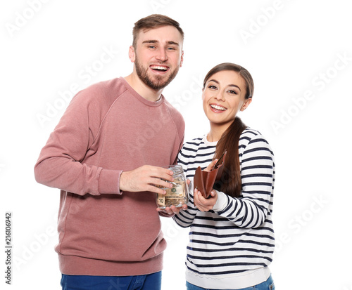 Happy couple with glass jar...