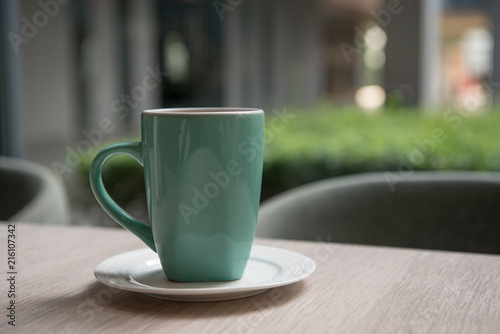 ceramic coffee cup on table