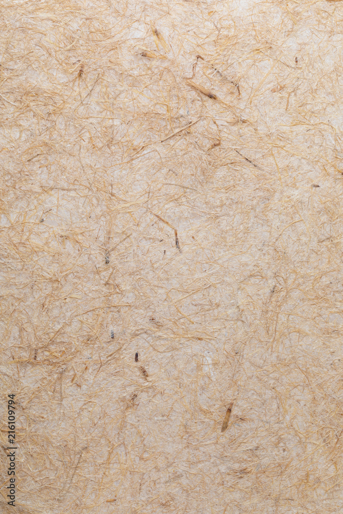 Handmade paper texture with vegetable fibers like straw. In delicate tones, yellows, oranges, browns and vanilla. Handmade paper texture with vegetable fibers like straw. In delicate tones, yellows, oranges, browns and vanilla.