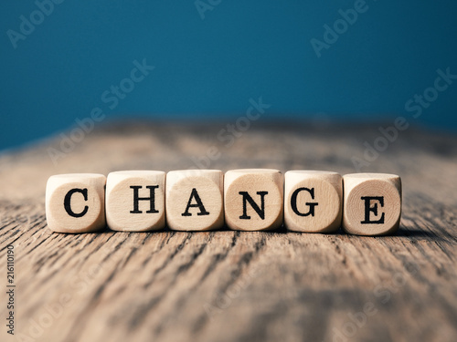 The word Change on small dices