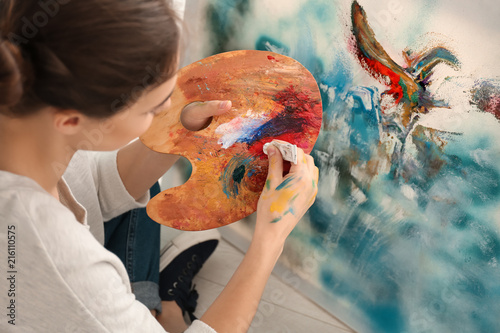 Woman Painting Abstract Art...