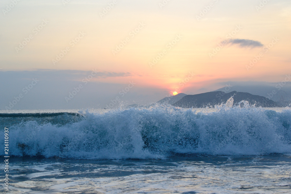 Waves on sunrise in Nha Trang