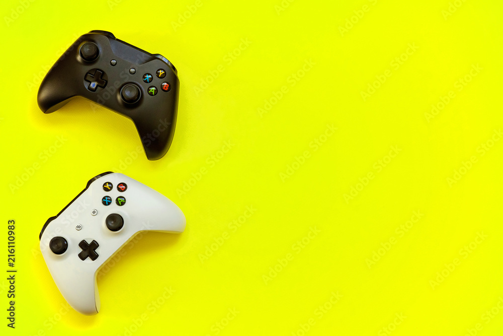 Black and white joystick xbox one s gamepad, game console on yellow  colourful trendy modern fashion pin-up background. Computer gaming  competition videogame control confrontation concept foto de Stock | Adobe  Stock