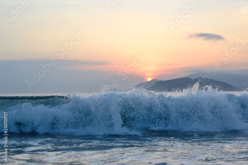 Waves on sunrise in Nha Trang