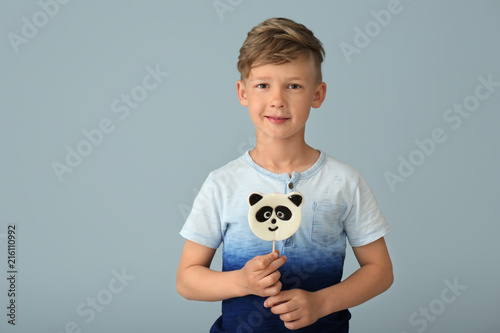 Cute little boy with lollip...