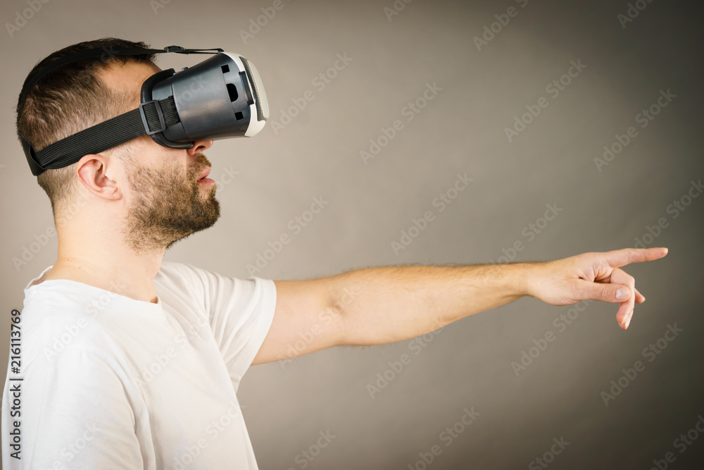 Adult man wearing vr goggles Adult man wearing vr goggles
