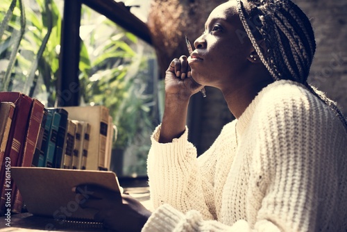 Portrait of black woman with dreadlocks hair