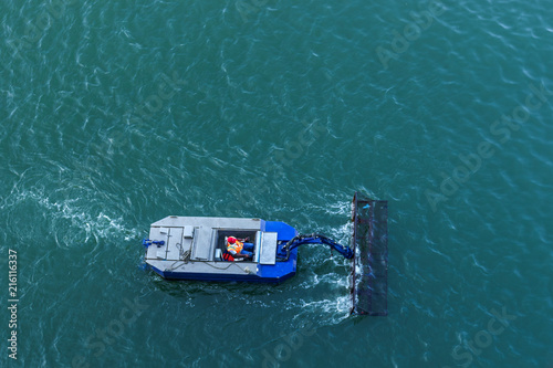 Collecting waste from the sea, Santo Domingo, Dominican Republic
