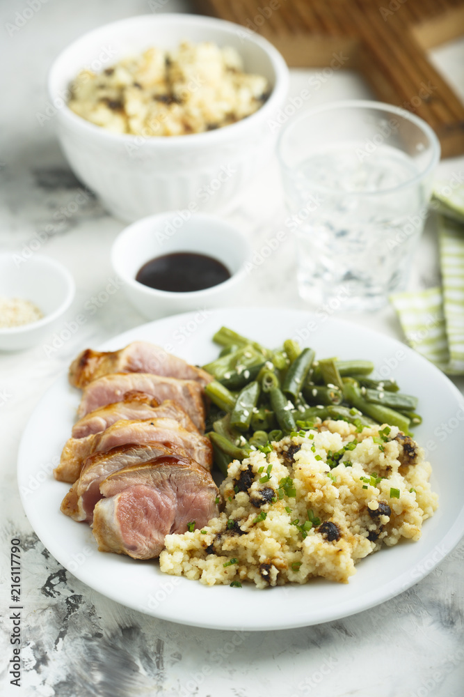 Veal fillet with green beans and couscous 
