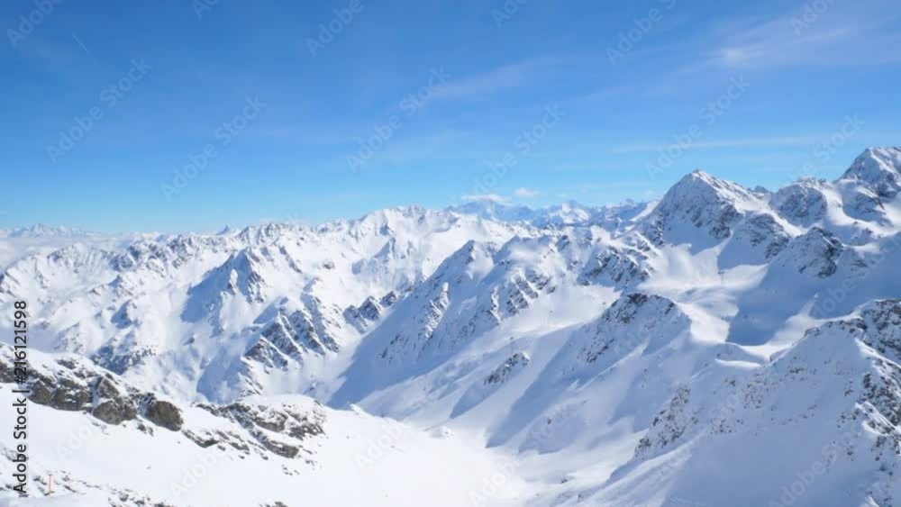 Pan of Stunning Snow Covered Mountains from on top of the Swiss Alps Pan of Stunning Snow Covered Mountains from on top of the Swiss Alps