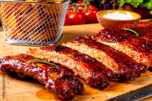 BBQ spare ribs from a charcoal grill