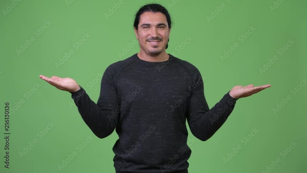 Handsome man choosing between left and right Handsome man choosing between left and right