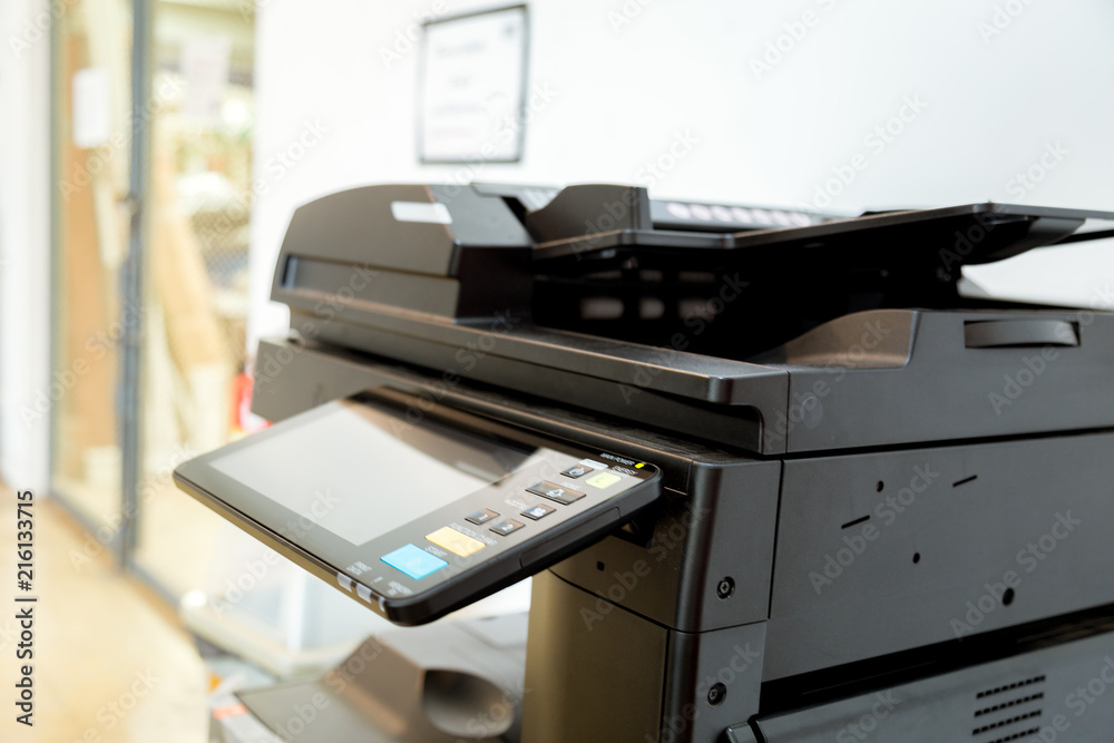 Close up paper sheets on the printer in office room. Close up paper sheets on the printer in office room.