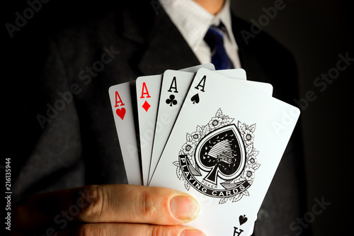 Fototapeta Naklejka Na Ścianę i Meble -  The businessman boasts his aces