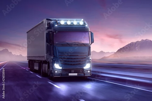 Obraz Ciężarówka na autostradzie podczas niebieskiej godziny