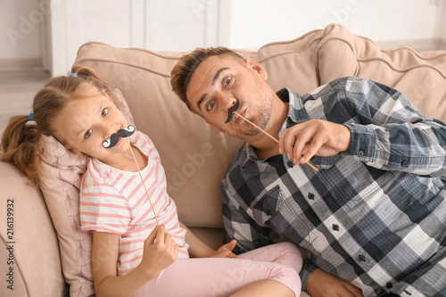 Father and daughter playing...