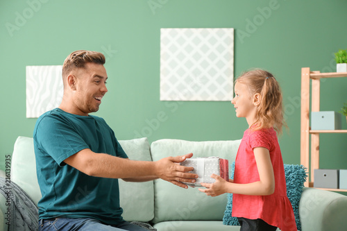 Cute little girl greeting h...
