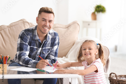 Happy father and daughter d...