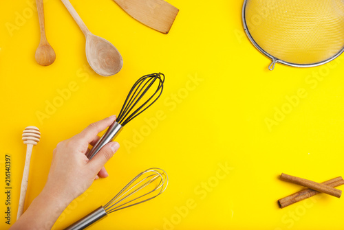 Konstfotografi Tools pastry kitchen utensile for cooking dessert, over yellow background with copy space, still life