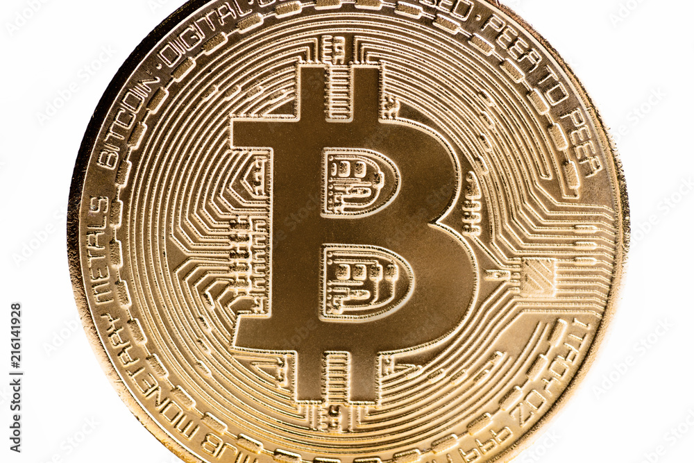 Macro shot of golden bitcoin on the white background. Virtual money.