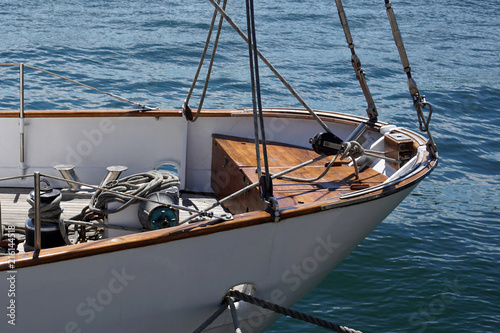 Bow of a white sailing yacht  against the blue sea © MishaelPervak