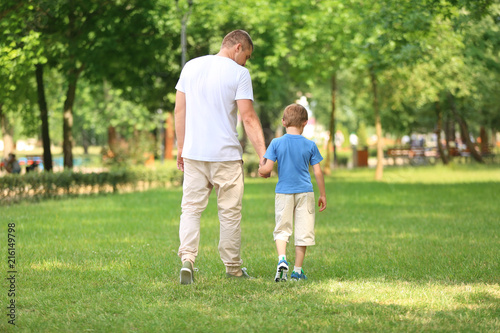 Happy father and son in gre...