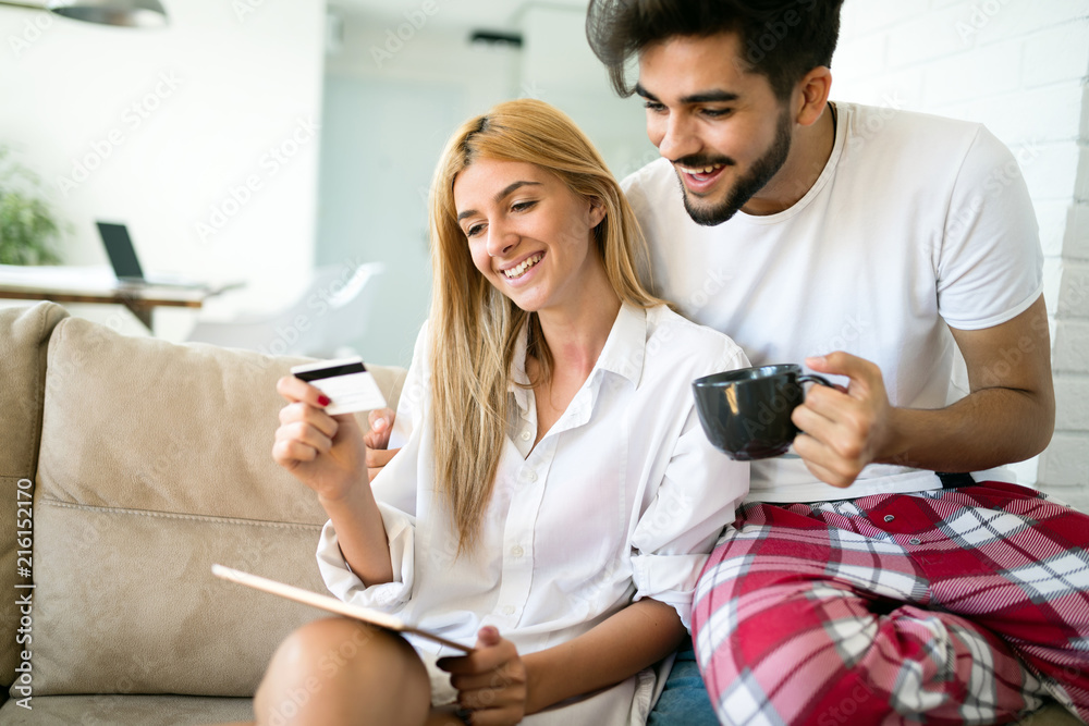 Couple shopping online using tablet Couple shopping online using tablet