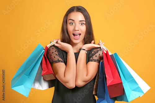 Excited young woman with sh...