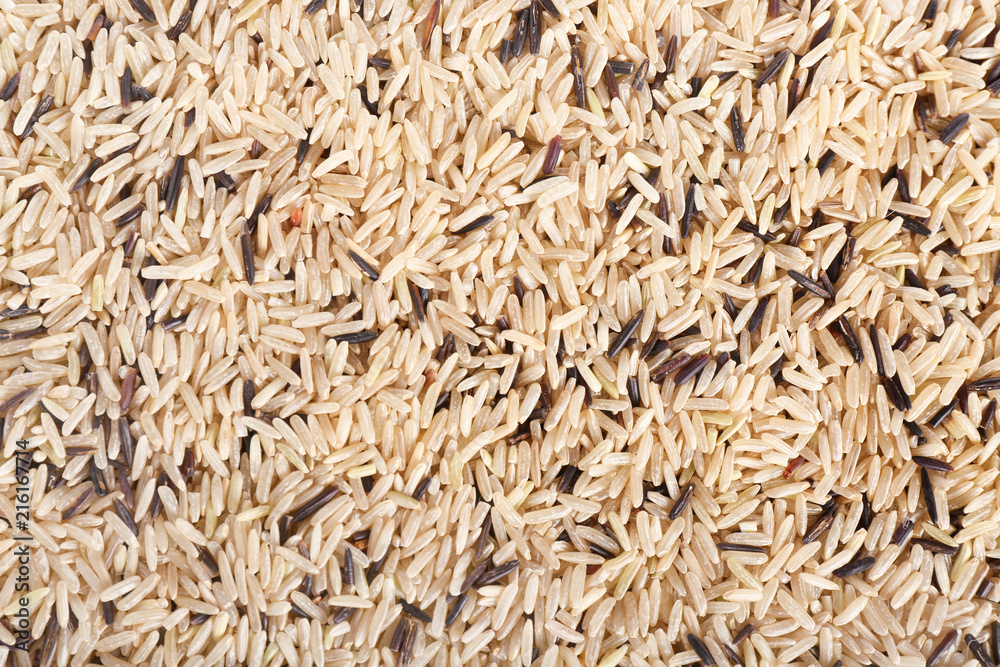 Raw long grain rice as background Raw long grain rice as background