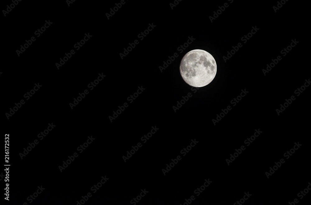 Beautiful Full Moon Isolated in the Dark Night Beautiful Full Moon Isolated in the Dark Night