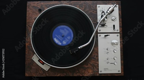 Top view of turntable and vinyl record photo