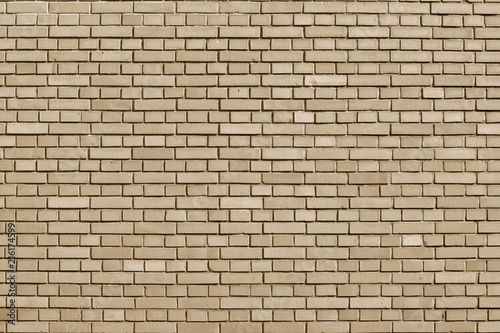 Almond Buff colored brick wall background