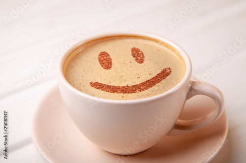 Cup of coffee with smile face on foam. I like coffee break
