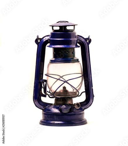 Old kerosene lamp on a white background