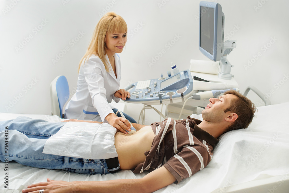 Doctor examination a man at abdomen Usg Doctor examination a man at abdomen Usg