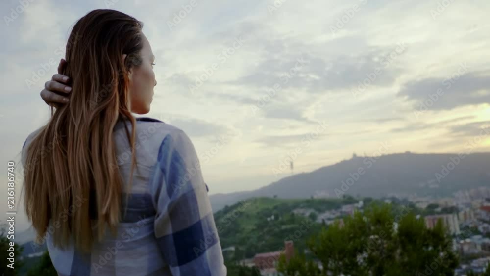 Beautiful woman enjoying Barcelona city view from Bunkers del Carmel, Spain Beautiful woman enjoying Barcelona city view from Bunkers del Carmel, Spain