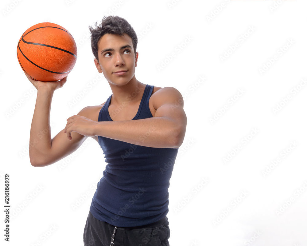 Teen sportsman with sportswear playing basketball. White background.