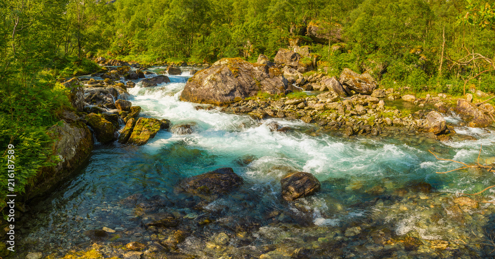 Beautiful mountain river near Trollstigen in Norway Beautiful mountain river near Trollstigen in Norway